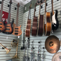 Wall of guitars and other instruments