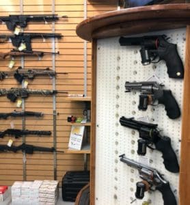 Rifles and handguns on display